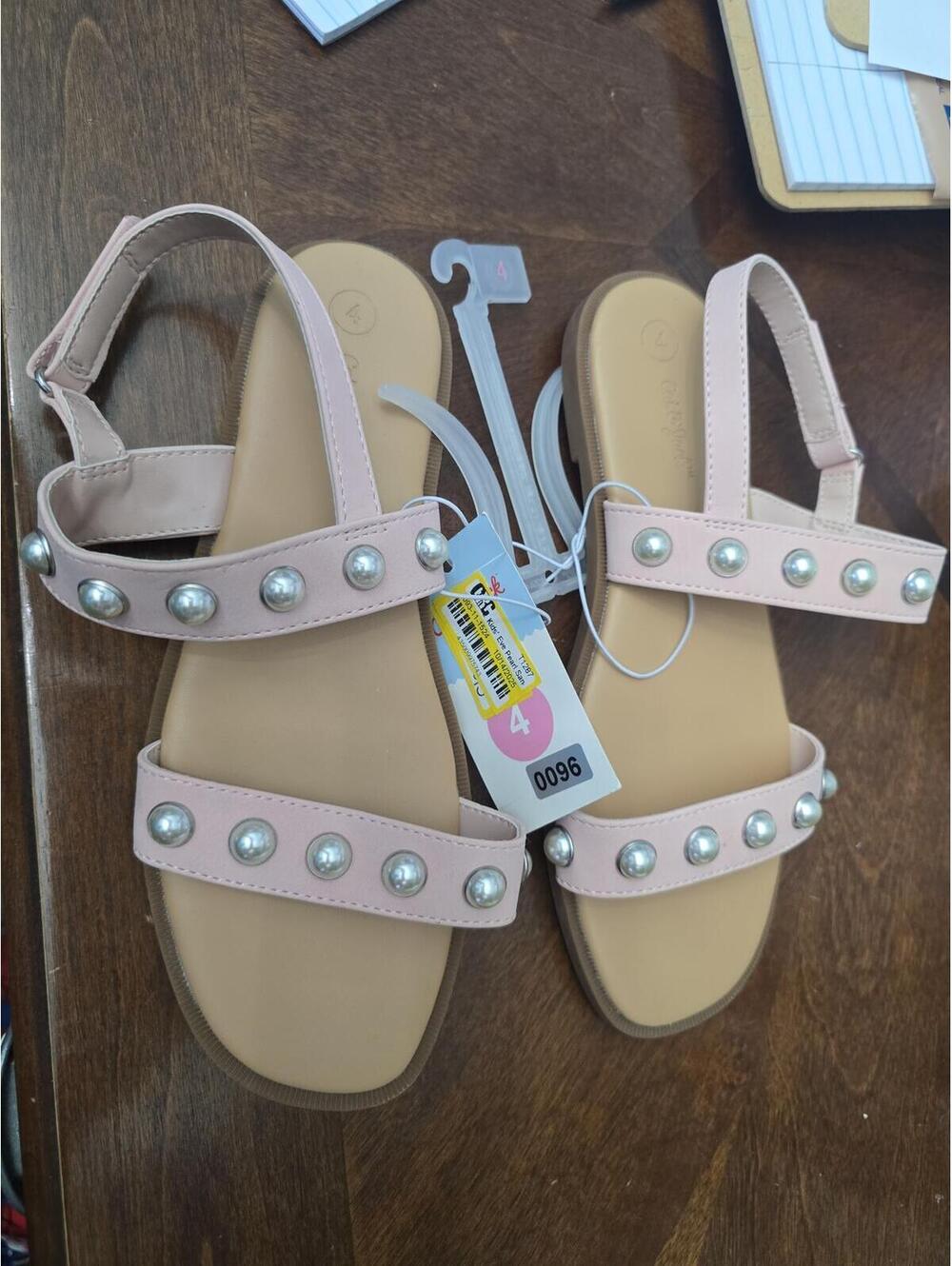 Size 4 brand new, big kid, sandals from target.Item 96 bin 11